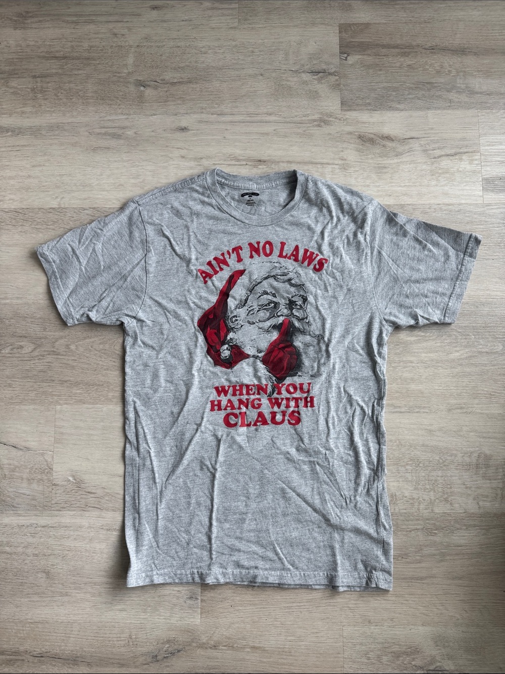 Ain’t no laws Holiday Time Gray Short-Sleeve Tee with Red Santa Graphic